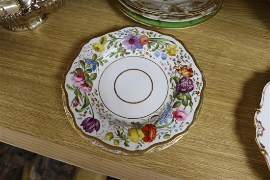 A small collection of decorative floral painted dessert dishes